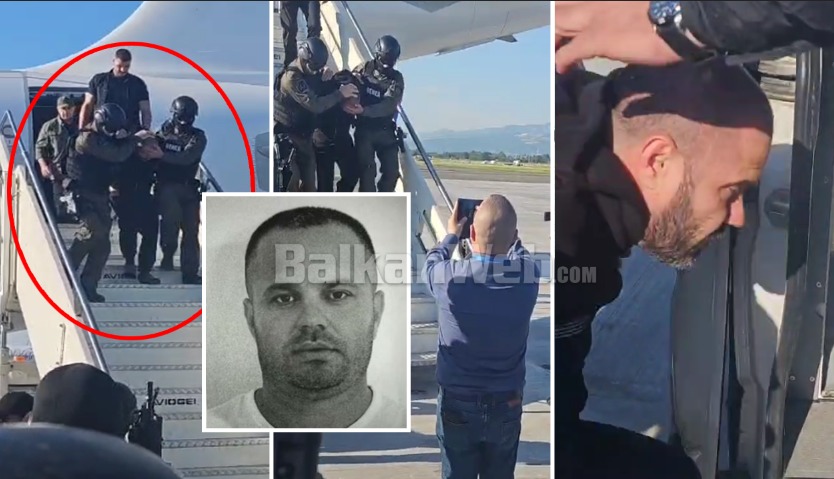 VIDEO/ Me pranga në duar dhe kokën ulur, momenti kur Florenc Çapja mbërrin në Rinas, ja pamjet e të shumëkërkuarit. Efektivët e RENEA-s e mbajnë për krahu